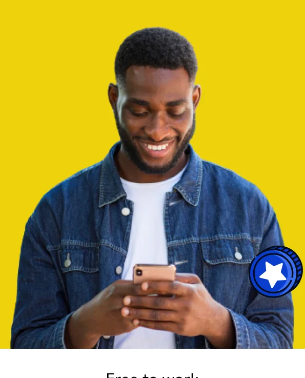 Young man smiling at his phone