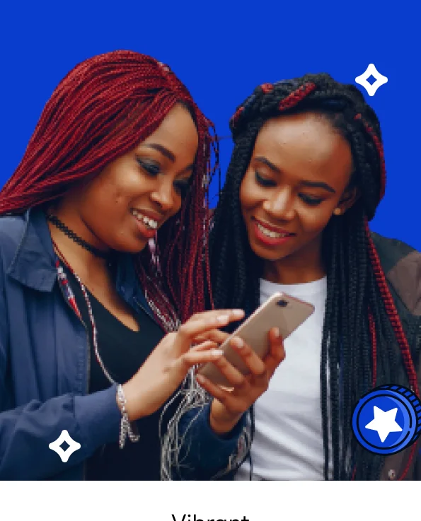 Two friends looking at a phone